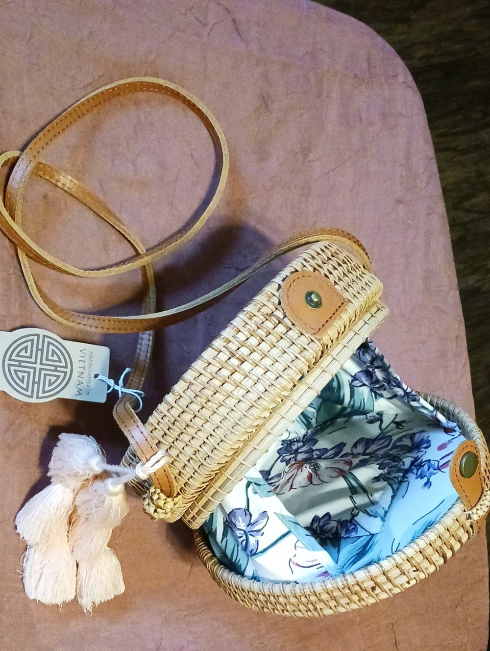 Hand Woven Rattan Round Crossbody Bag With A Tan Leather Strap